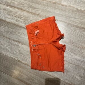American eagle size 8 Jean shorts- frayed hem. Orange